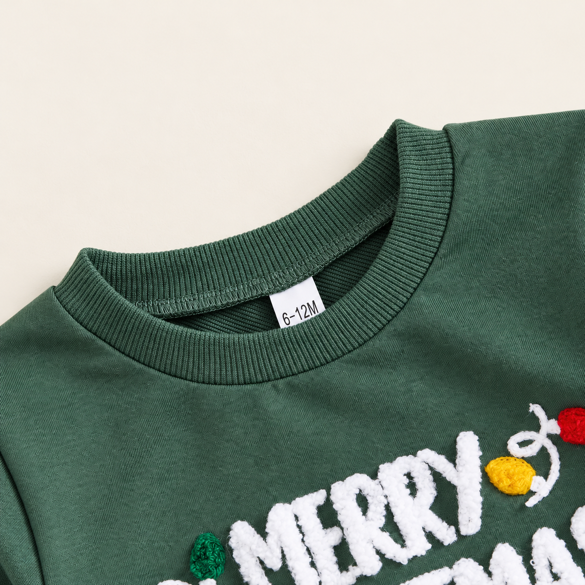 Green ribbed neckline and chenille detail