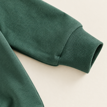 Green ribbed sleeve cuff detail